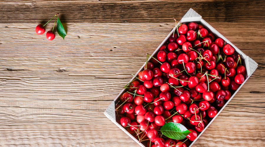 envase de madera cerezas